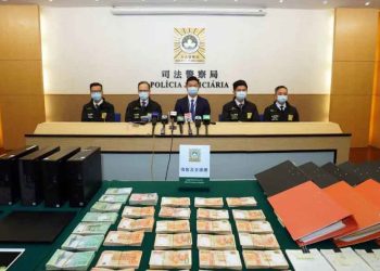 Macau’s Judiciary Police confirms a Mr Chau, aged 47, as one of 11 arrested for alleged criminal association, illegal gambling, money laundering