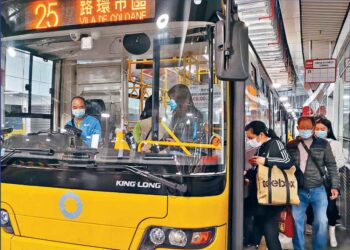 Macau drops mask mandate for public buses